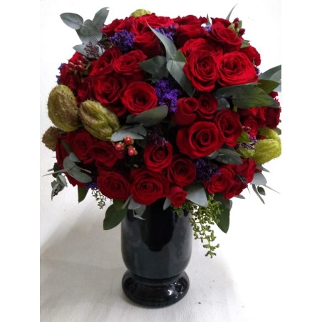 Arreglo redondo de 100 rosas rojas en cerámica | Florería Versalles CDMX