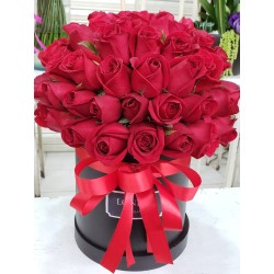Arreglo redondo de 100 rosas rojas con moño | Florería Versalles CDMX